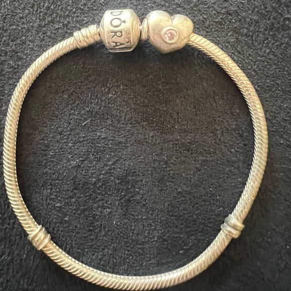 Pandora Jewelry - Pandora Moments Snake Chain Bracelet. Features a heart charm w/ pink stone, 7.5”